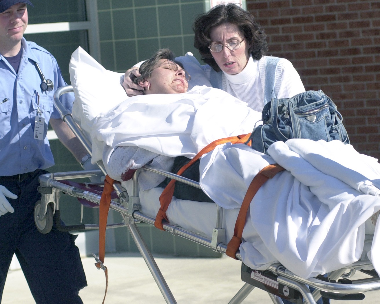 Norina Bentzel being carried on a stretcher after the attack